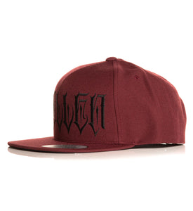 Blood red hat with black tattoo font logo