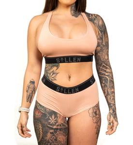 pink panties worn by tattooed model